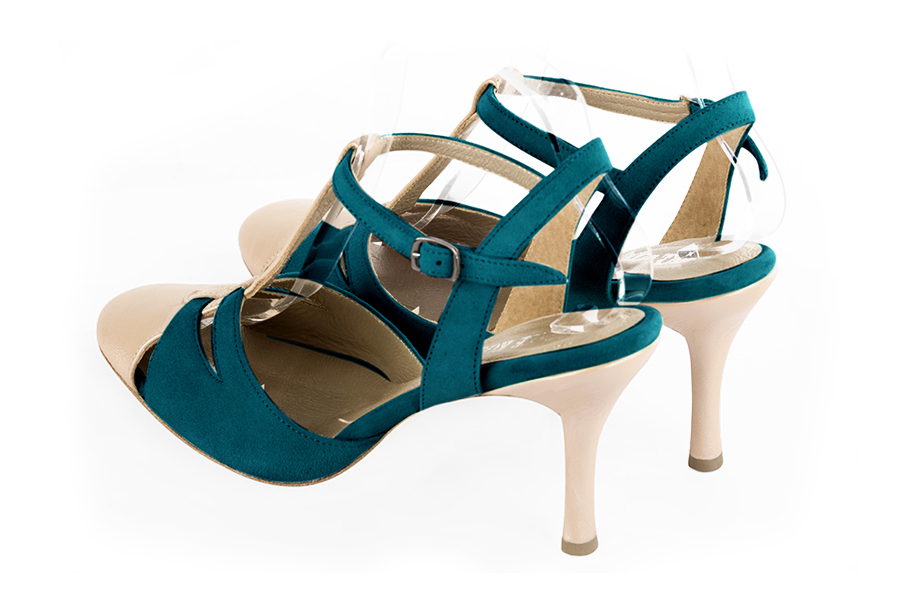 Gold and peacock blue women's open back T-strap shoes. Round toe. High slim heel. Rear view - Florence KOOIJMAN